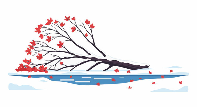 Fallen tree with red leaves in snow by icy water