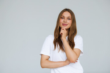 Fototapeta premium Focused smart girl look touch hand chin think decide on white background