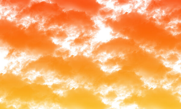 Warm gradient of orange and yellow clouds against a white background