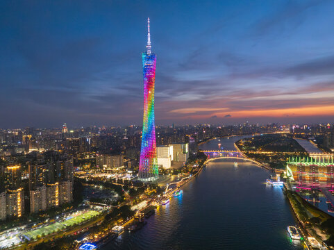 Aerial View of Guangzhou Tower Illuminated at Dusk over the Pearl River