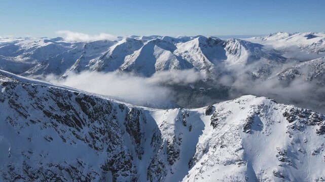 Amazing Aerial Winter view of Rila mountain near Musala peak, Bulgaria