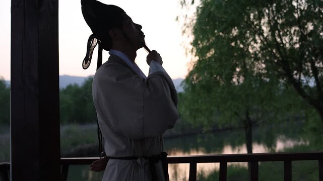 Ancient Chinese people pondering problems by the river at sunset
