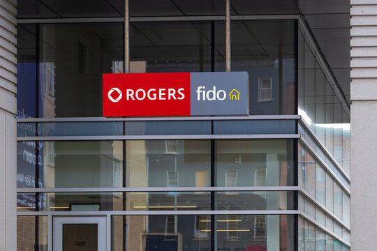 Quebec City, Quebec, Canada, May 31, 2026 - Rogers and Fido signs on store located at 305 Charest East boulevard in the lower downtown