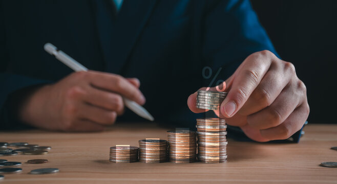 Businessman with interest rate growth, return on investment ROI, personal financial planning, wealth accumulation strategy, central bank monetary policy adjustments, savings accounts, asset management