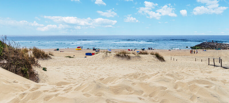 Panoramic view of the sandy dunes and the Atlantic ocean at the beach in Costa Nova.