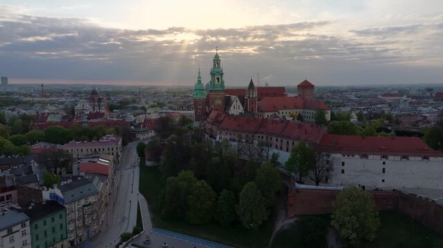 Aerial flyover of Wawel Castle in Krakow at dawn in spring