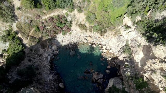 Majestic Natural Rock Arch over Turquoise Sea at Delikdeniz Kral Koyu, Turkey