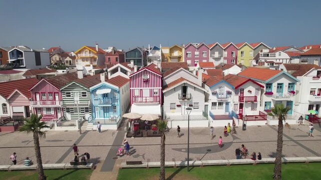 Costa Nova Striped Houses. Aerial drone Shot of colourful Buildings along Costa Nova do Prado beach, Aveiro, Portugal.