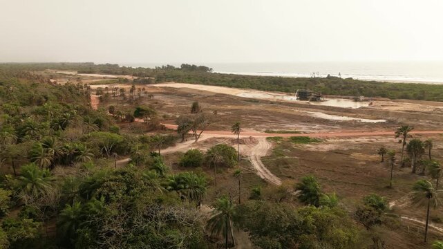 aerial view open pit zircon mine in Abene in Sengal in Africa, exploitation of resources in natural protected area