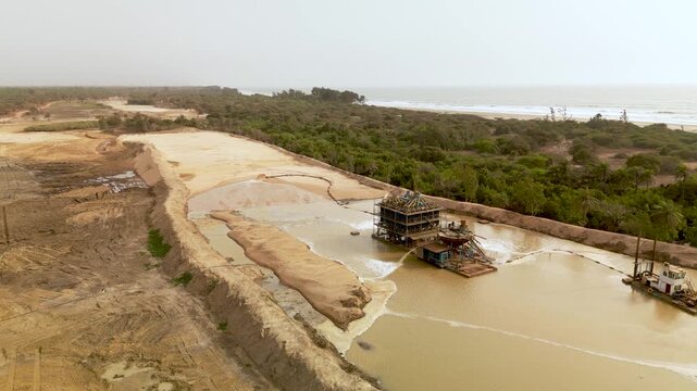 aerial view open pit zircon mine in Abene in Sengal in Africa, exploitation of resources in natural protected area