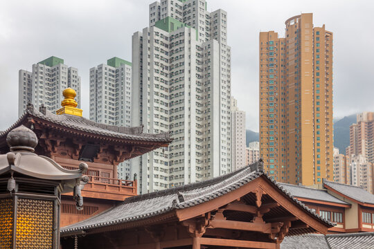 Ancient Temple Rooftops and Residential Skyscrapers in Hong Kong City