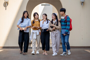 Fototapeta premium Students engaging in lively conversation at university campus group interaction outdoor setting dynamic perspective