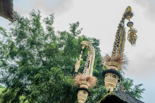 Indonesian statue in a temple with offerings