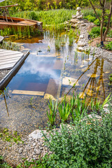 Obraz premium Beautiful classical garden fish pond for your backyard or patio