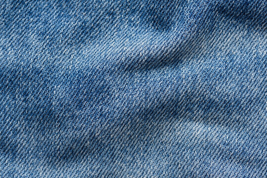 Washed denim fabric texture background