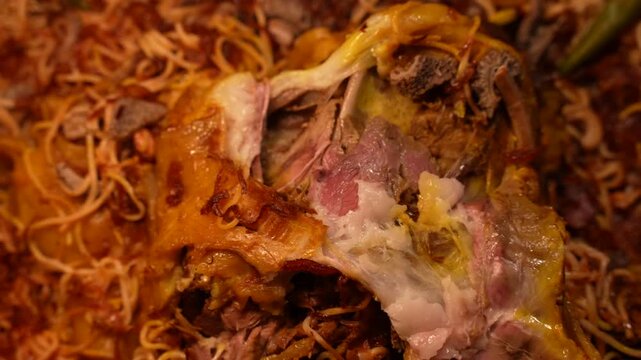 Saudi Man Eating Lamb Mandi meat with his right Hand 