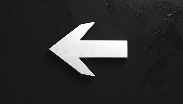 White arrow sign on dark background