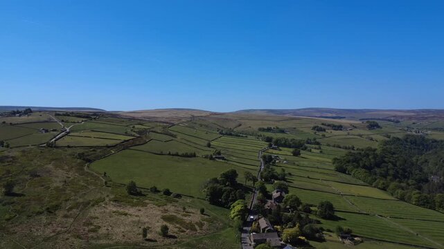 scenic aerial view of slack bottom near heptonstall showing country roads and houses surrounded by meadows and moorland