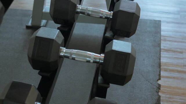 Dumbbell Rack in Gym. Close-Up of Weight Equipment in Modern Fitness Center