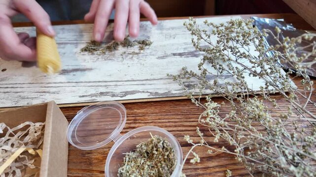 Roll a wax candle in mugwort for meditation