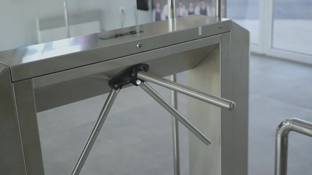 Automated security barrier ensures restricted entry into facility. Polished metal design creates professional and highly secured atmosphere