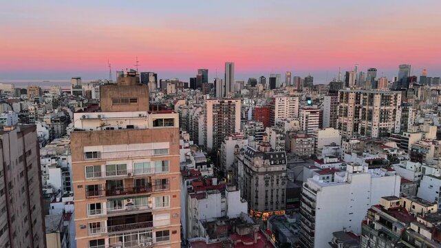 Aerial Pan Of Buenos Aires City Skyline At Sunset With Corrientes Avenue And Downtown Buildings Argentina