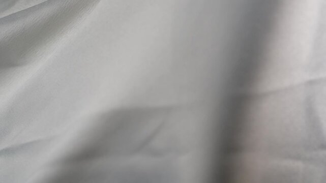 fluttering white fabric in slow mo