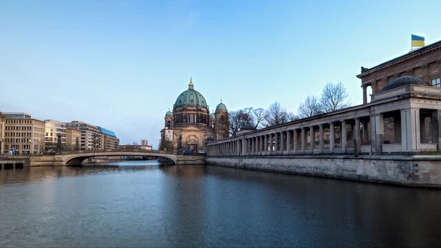 Hyperlapse of Berlin Cathedral and Spree river bridge. Day to night transition and building illumination