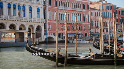 Gondolas Moored in Venice Lagoon with San Giorgio Maggiore in Background © kohanova1991