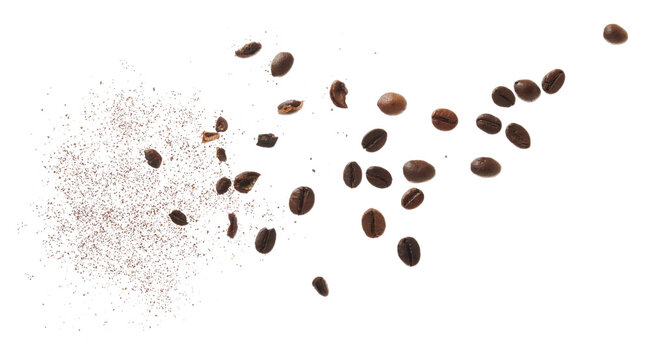 Coffee beans, pieces and ground flying, isolated on white background, macro, clipping path, design element