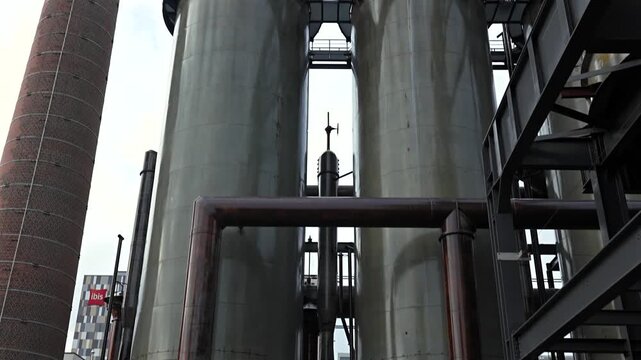 Historic steel silos and brick chimney in Belval Luxembourg