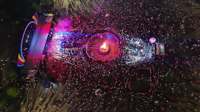 Aerial View of Ethnic Dance Around Bonfire at Night, Colorful Costumes, Guangxi 