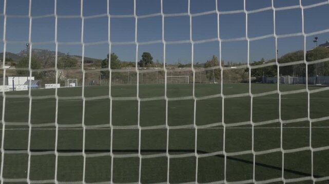 Football soccer field ground pitch stadium goal net crane jib traveling down 7