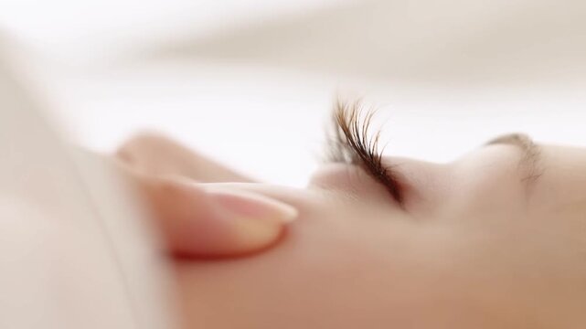Gentle touch on sleeping face: closeup, relaxing moment