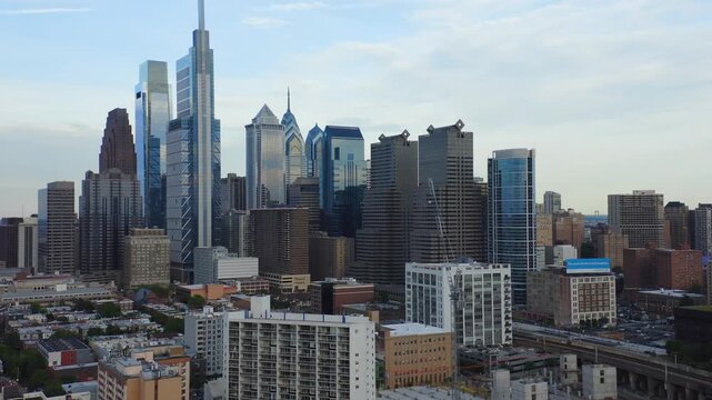 Philadelphia skyline aerial view during sunset featuring skyscraper district and urban development in Pennsylvania.
