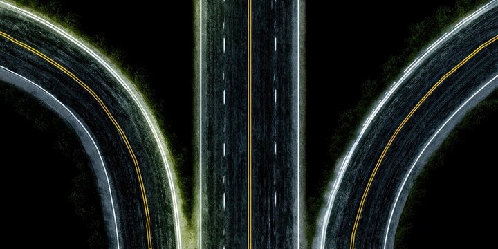 A T-junction highway split splits into two curving paths on black