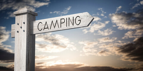 Camping - wooden signpost with one arrow © PX Media