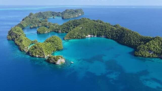 Shallow, fringing coral reefs thrive amid Palau's scenic Ulong Islands. This tiny and beautiful island-nation is a popular destination for divers, snorkelers, kayakers, and World War II buffs. 
