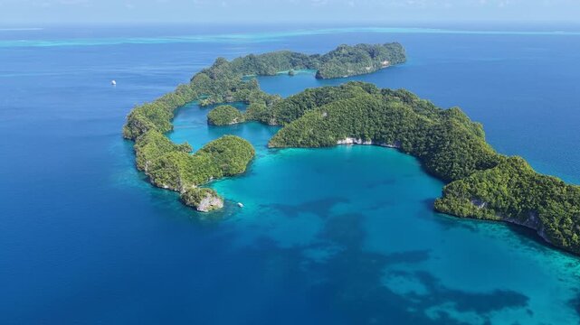 Shallow, fringing coral reefs thrive amid Palau's scenic Ulong Islands. This tiny and beautiful island-nation is a popular destination for divers, snorkelers, kayakers, and World War II buffs. 