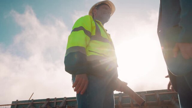 Manager, architect and handshake for deal at construction site, introduction or property partnership. Below, project agreement or people shaking hands for collaboration, labor contract and greeting