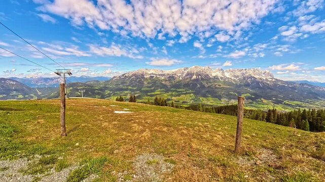 4K Timelapse alpine summer video with moving clouds at Mount Hartkaiser, Ellmau, Kufstein, Tyrol, Austria