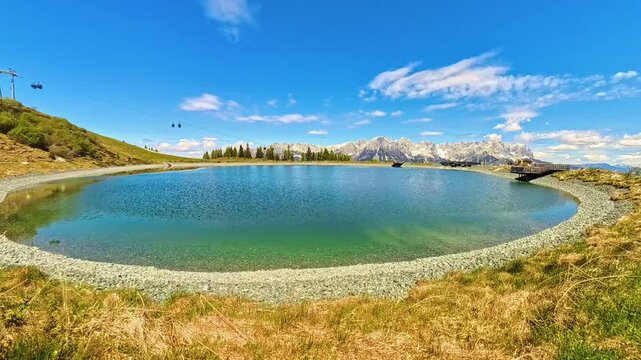 4K Timelapse alpine summer video with moving clouds at Mount Hartkaiser, Ellmau, Kufstein, Tyrol, Austria
