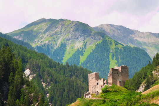 Tschan&uuml;ff Castle, a ruined castle in the Alpine village of Ramosch. Valsot, Canton of Graub&uuml;nden, Switzerland.