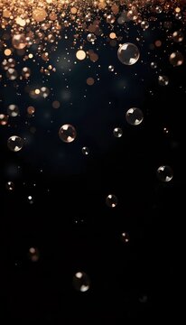 A black background with lots of bubbles floating in the air.