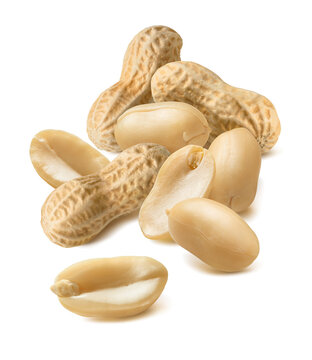 Pile of peeled and whole unpeeled peanuts. Package design element. Real food