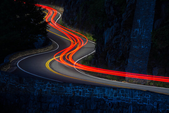 Long Exposure Light Trails Along Winding Hawks Nest Road Near Port Jervis On A Scenic Night Drive