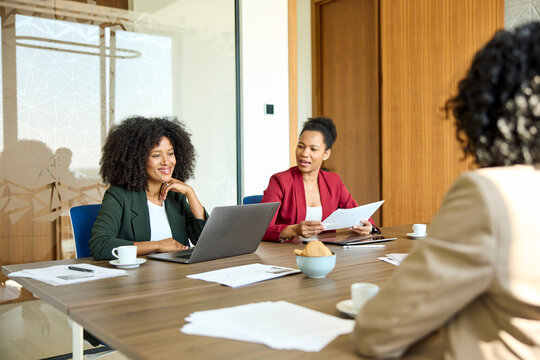 Women Having a Meeting in a Modern Office