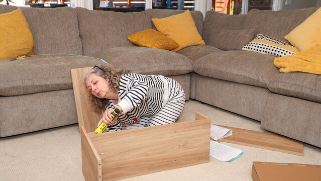 Woman Assembling Furniture
