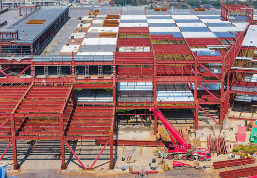 Steel Frame Building Construction with Red Crane