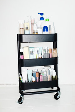 Trolley full of beauty cosmetic products and make up products 